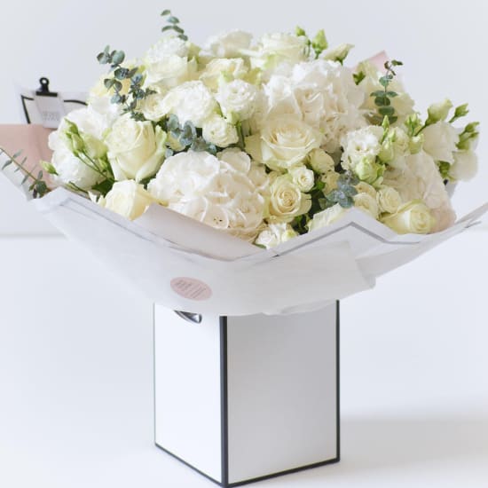 Beautifully Simple Showstopper White Flower Bouquet.