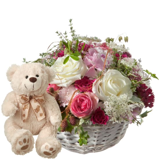ours en peluche avec des roses
