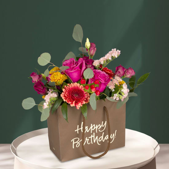 Fleurop Blumentasche «Happy Birthday» - in kräftigen Farben