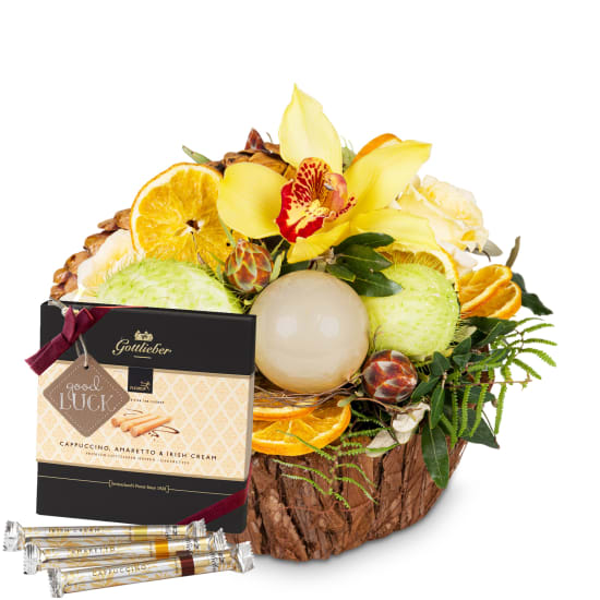 Blumengesteck «Festlicher Winterzauber» mit Gottlieber Hüppen und «Good Luck»-Anhänger