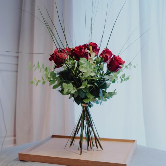 7 Red Roses with greenery