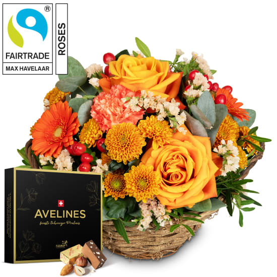 Blumengesteck «Pura Vida» mit Fairtrade-Rosen Max Havelaar und  Avelines Pralinés von Maestrani