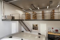 Ventilasjonsaggregat Nordic L6 SW montert i opphøyd posisjon i et verkstedsrom med tilkoblede ventilasjonskanaler