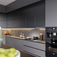 Kitchen fan Flexit Facet-M in white mounted beneath upper cabinets in a modern grey kitchen