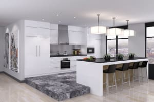 
                    Moderne kjøkken og åpen stueløsning i bolig, brukt som miljøbilde for boligventilasjon