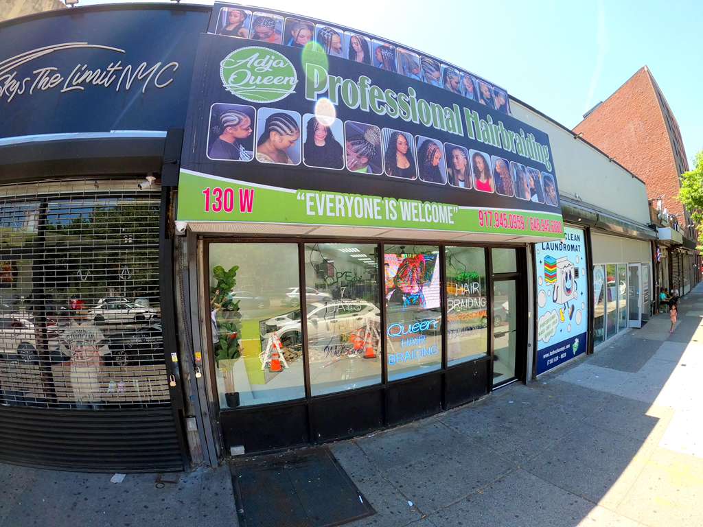 Outside of Adja Queen African Professional Hairbraiding salon on Fordham Road Bronx NY