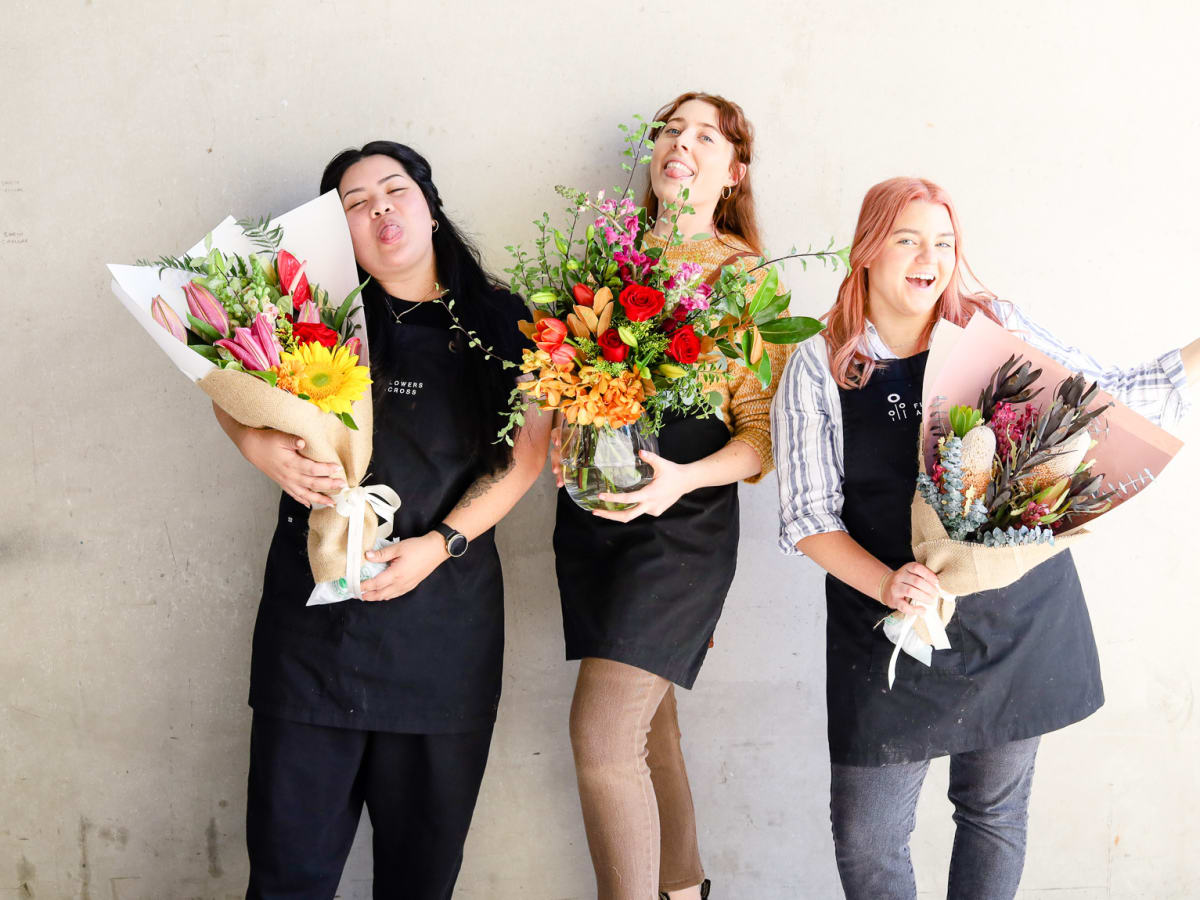 Flowers Across florist team arranging fresh bouquets