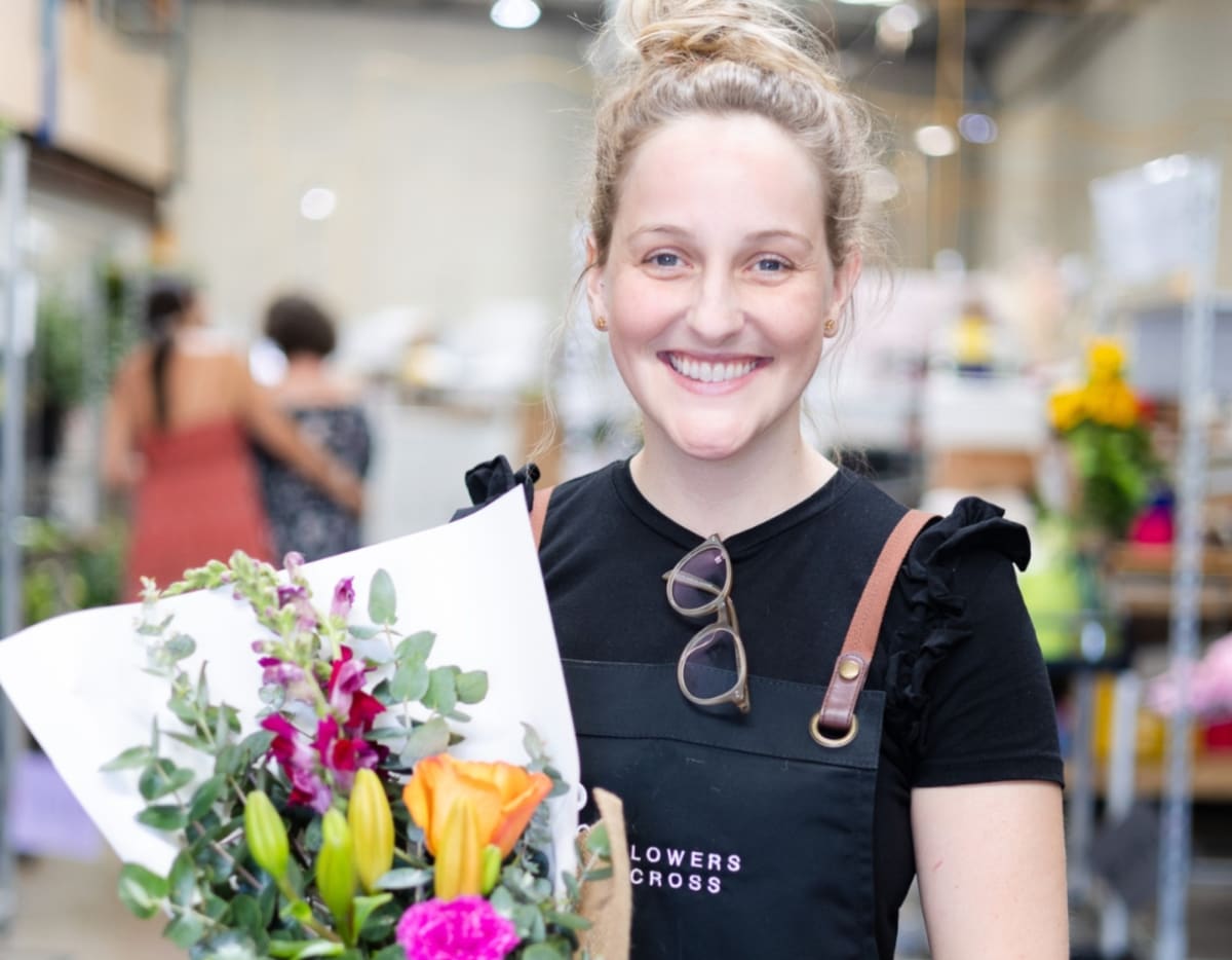 Customer service helping with flower selection in Melbourne