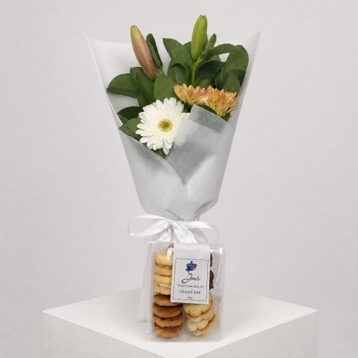 Daily Bouquet - Blush lilies, peach blooms, biscuit bonus