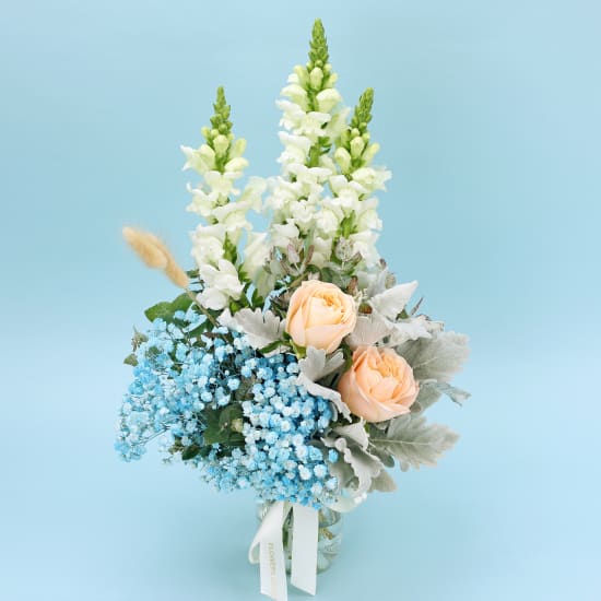 Snowy Sky Blue, White & Peach Rose Vase Arrangement - Deluxe