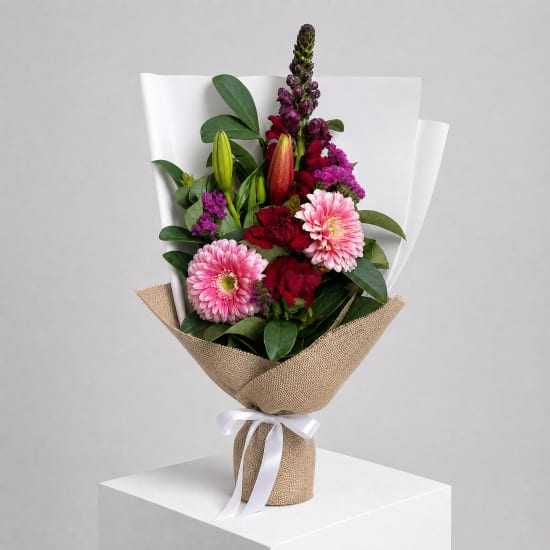 Daily Bouquet - Pink gerberas and red velvet lift - Standard