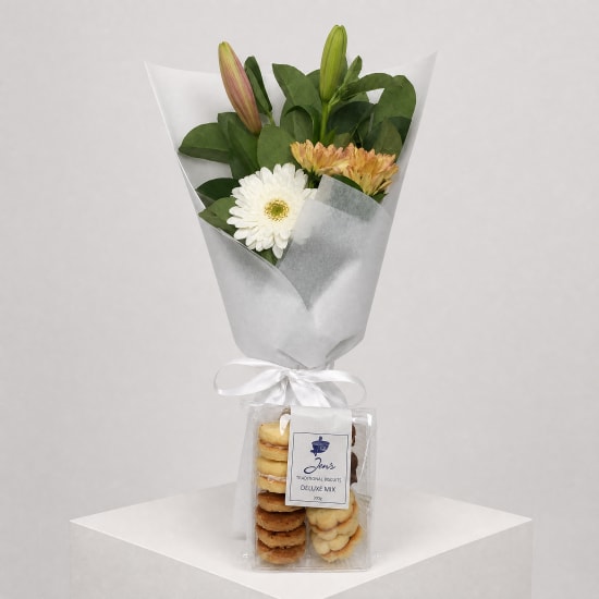 Daily Bouquet - Blush lilies, peach blooms, biscuit bonus - Standard