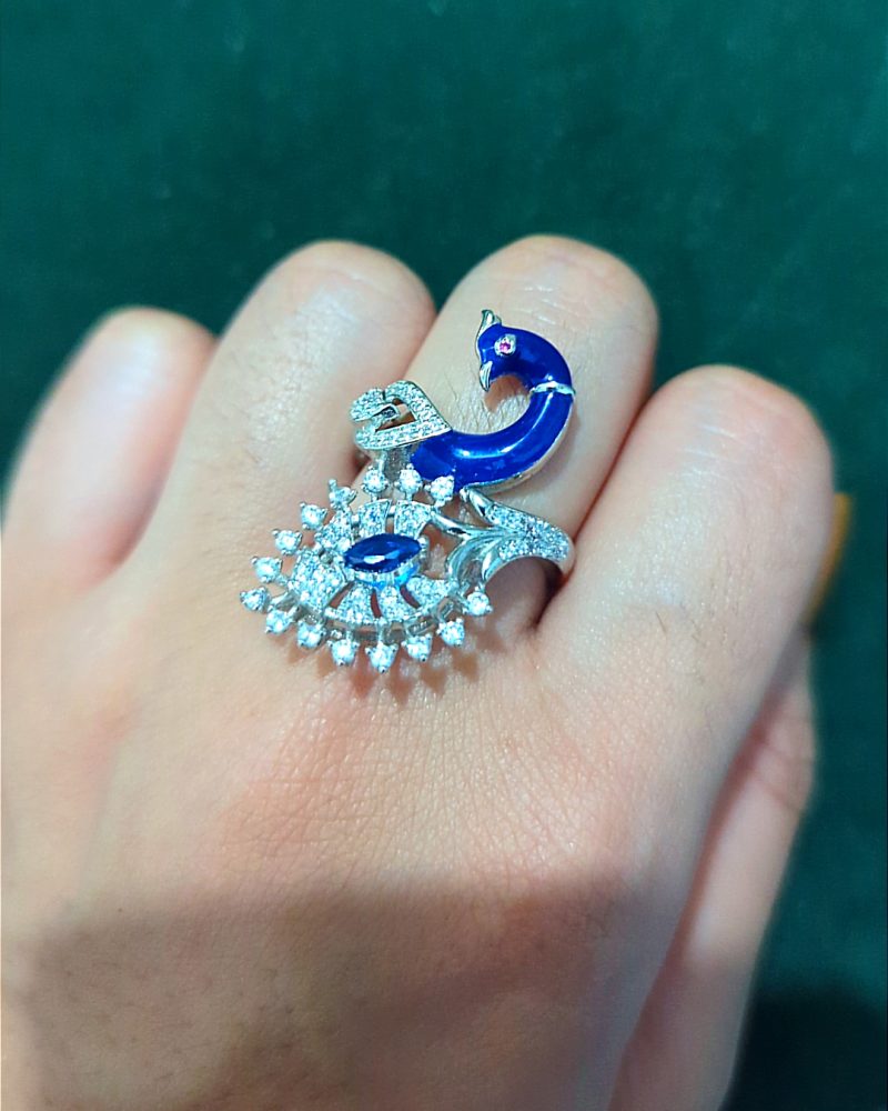 Rich peacock ring