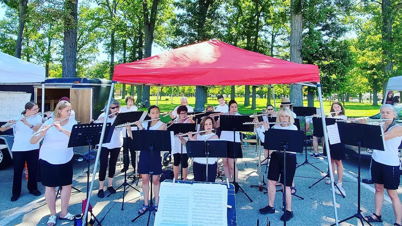 A photo of one of our Flute Choir practices outside.