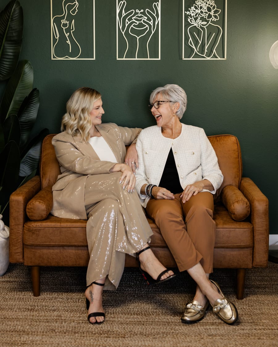 Paige Hardy Hill and Jill Hardy of The Hardy Group, Temecula Valley real estate agents, laughing together