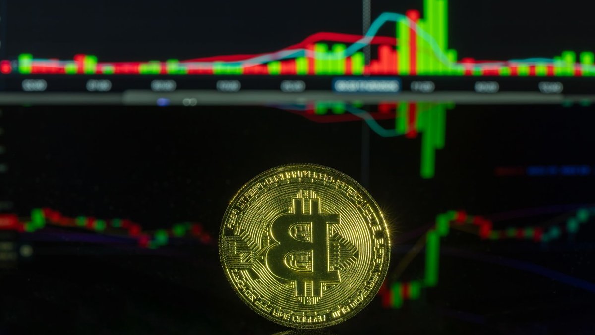 Brokers Debate Digital Assets vs. Established Markets at iFX EXPO Bitcoin coin with digital trading chart background representing crypto market analysis.