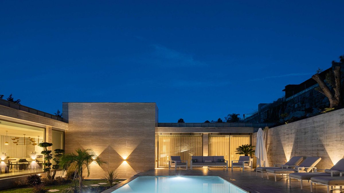 Portuguese Retaining Wall Transformed into Modern Home - modern home