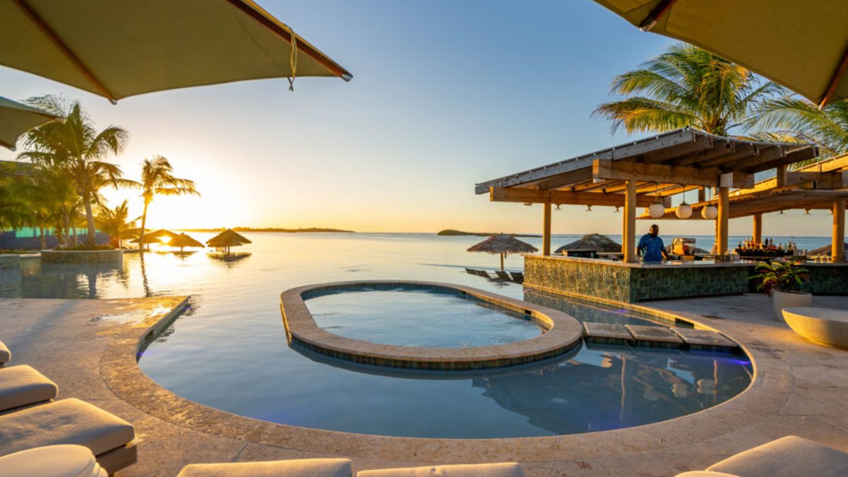 Luxury beach club opens in Bahamian private community - luxury beach club