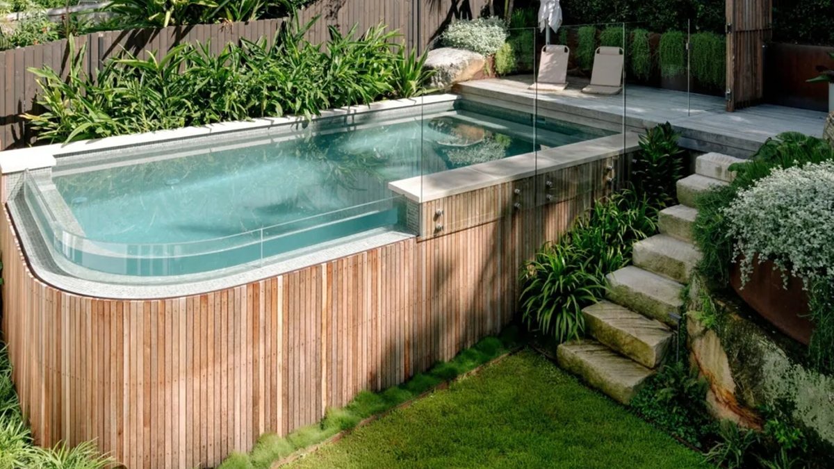 Sydney sloped backyard reborn as poolside garden - poolside garden