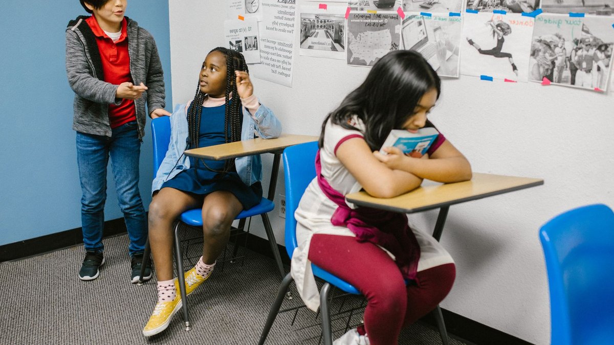 California students with disabilities left behind by rushed inclusion push A diverse group of students in a classroom highlighting bullying awareness.