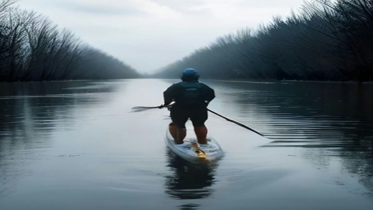 Kayakers handle flooded Marin County bike path - flooded bike paths