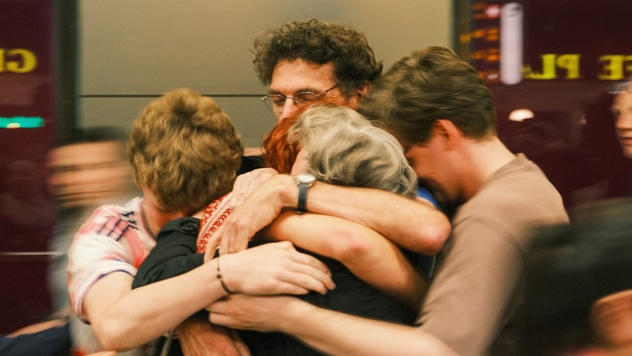 Van Schaik with her family at the airport