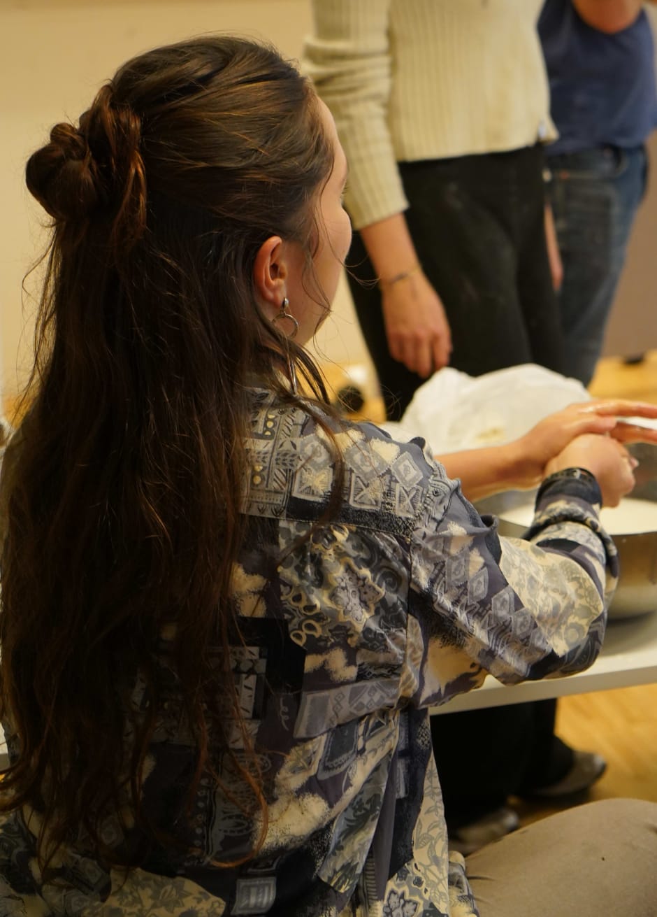 Loïs Hana kneads dough