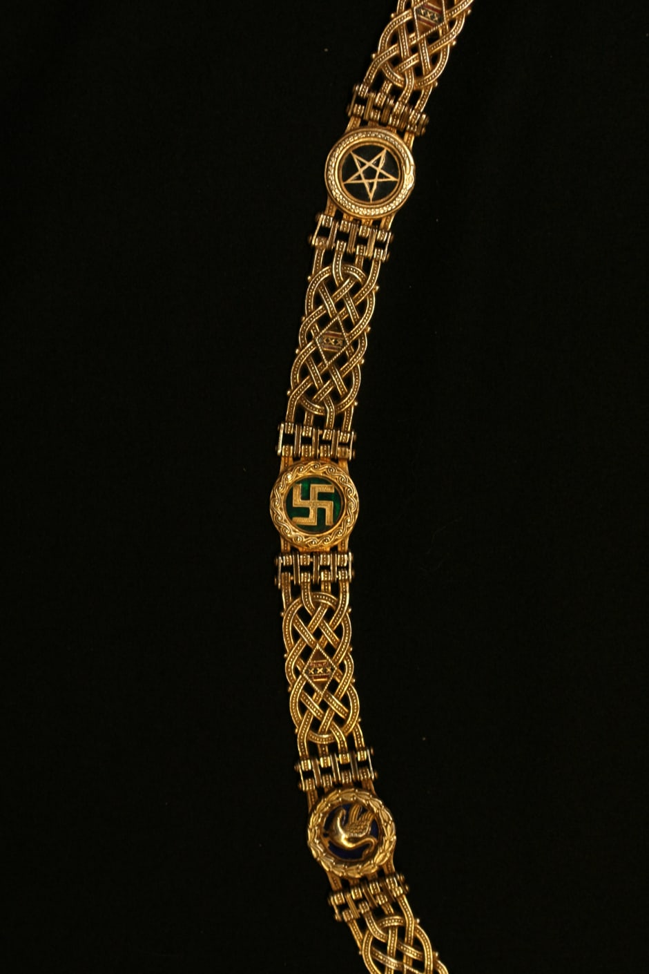 The chain with the swastika before the shield was added