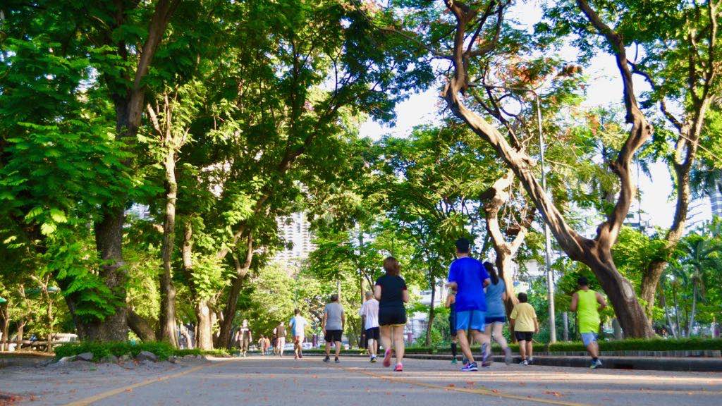 Jogging around the perimeter path Follow Me Bangkok Bicycle Tours