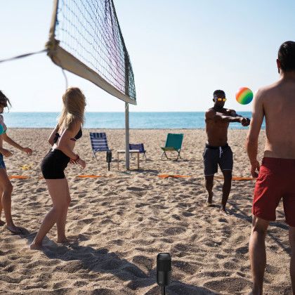 Custom iLive Indoor and Outdoor Bluetooth Solar Speakers - Black - In Use at Beach