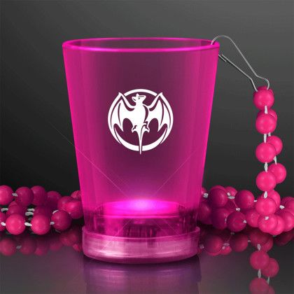 Custom 1.5 oz. Light Up Pink Shot Glasses on Pink Beads Custom 1.5 oz. Light Up Pink Shot Glasses on Pink Beads