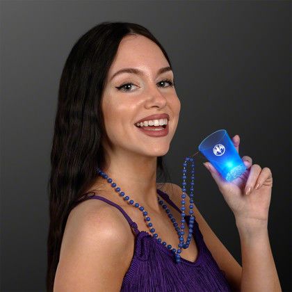 Custom 1.5 oz. Light Up Blue Shot Glass on Blue Bead Necklace - In use Custom 1.5 oz. Light Up Blue Shot Glass on Blue Bead Necklace - In use