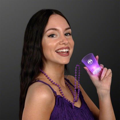 Custom 1.5 oz. Light Up Purple Shot Glasses on Purple Beads - In use Custom 1.5 oz. Light Up Purple Shot Glasses on Purple Beads - In use