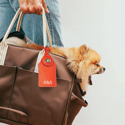 Custom Luggage Tag with Airtag Holder - Orange Lifestyle View Custom Luggage Tag with Airtag Holder - Orange Lifestyle View