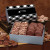 Custom Toffee & Pecan Clusters in Gift Box with Black Plaid Sleeve