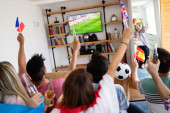 Soccer fans watching the World Cup with Promotional Products
