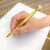 Custom Metal Twist Diamond Pen - Gold with clear  Lifestyle View 