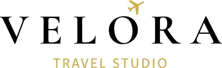 Velora Travel Studio logo