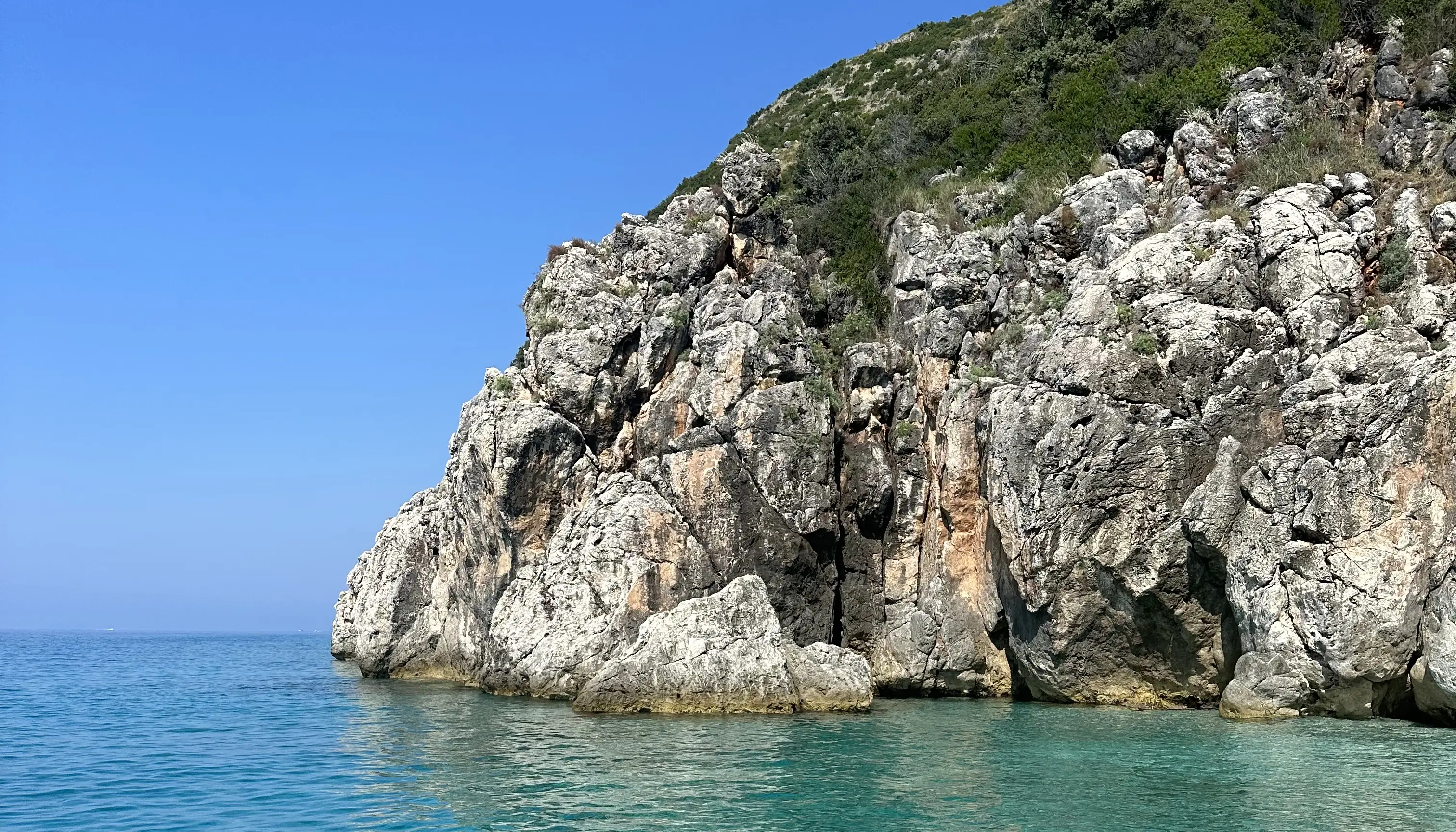 rock water daytime Albanian Riviera