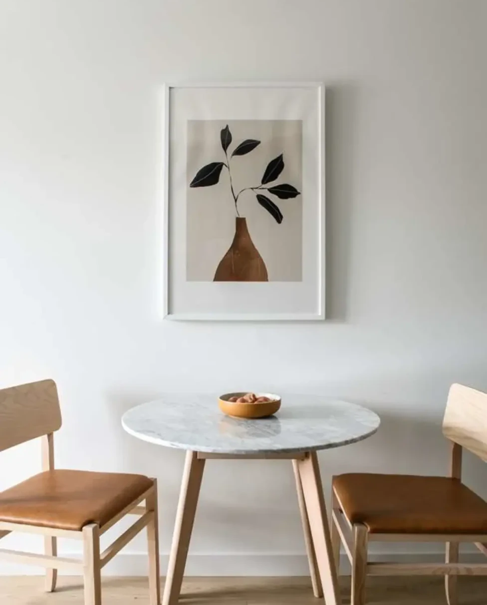 wooden chairs beside a round table