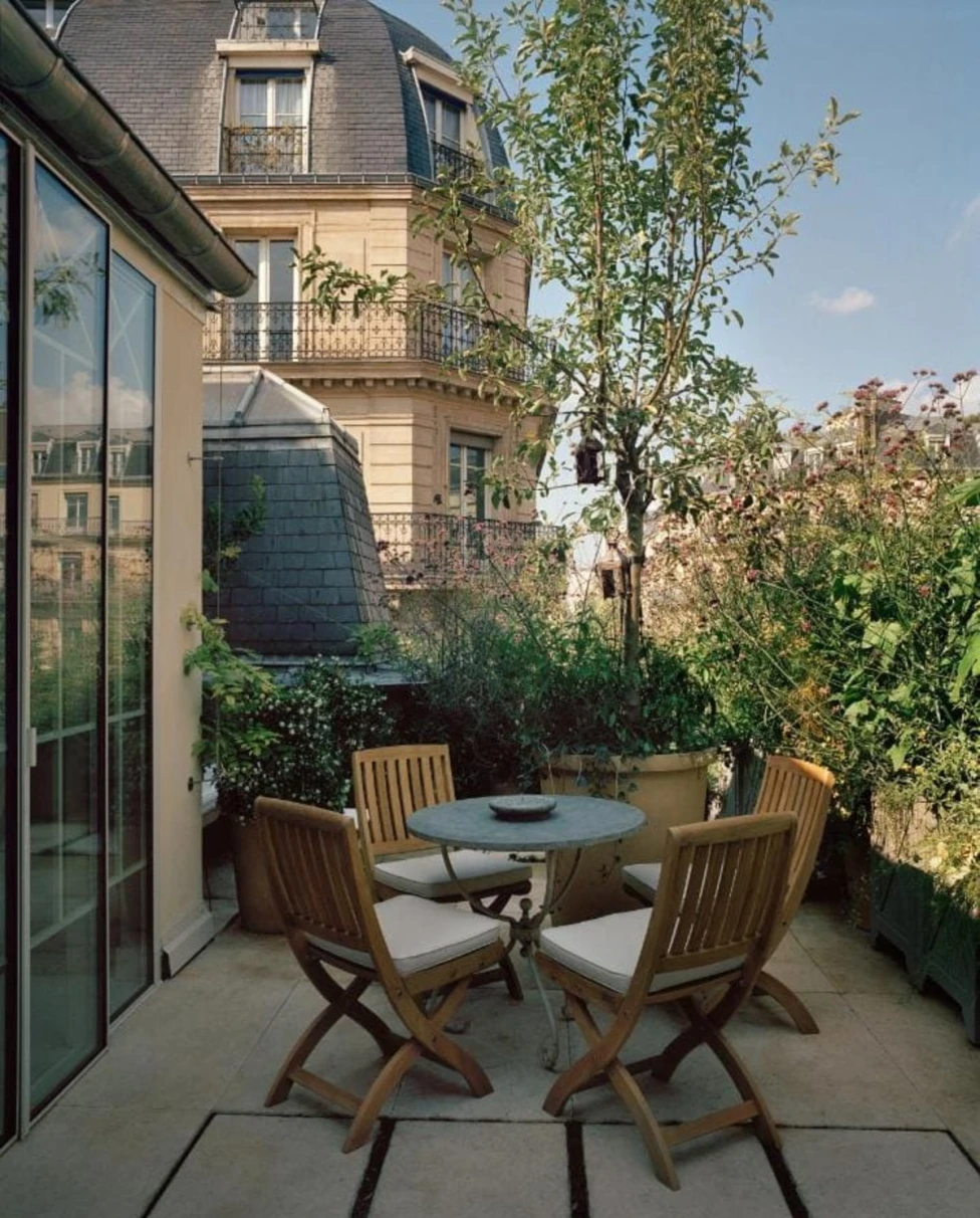 table and chairs on a secluded terrace