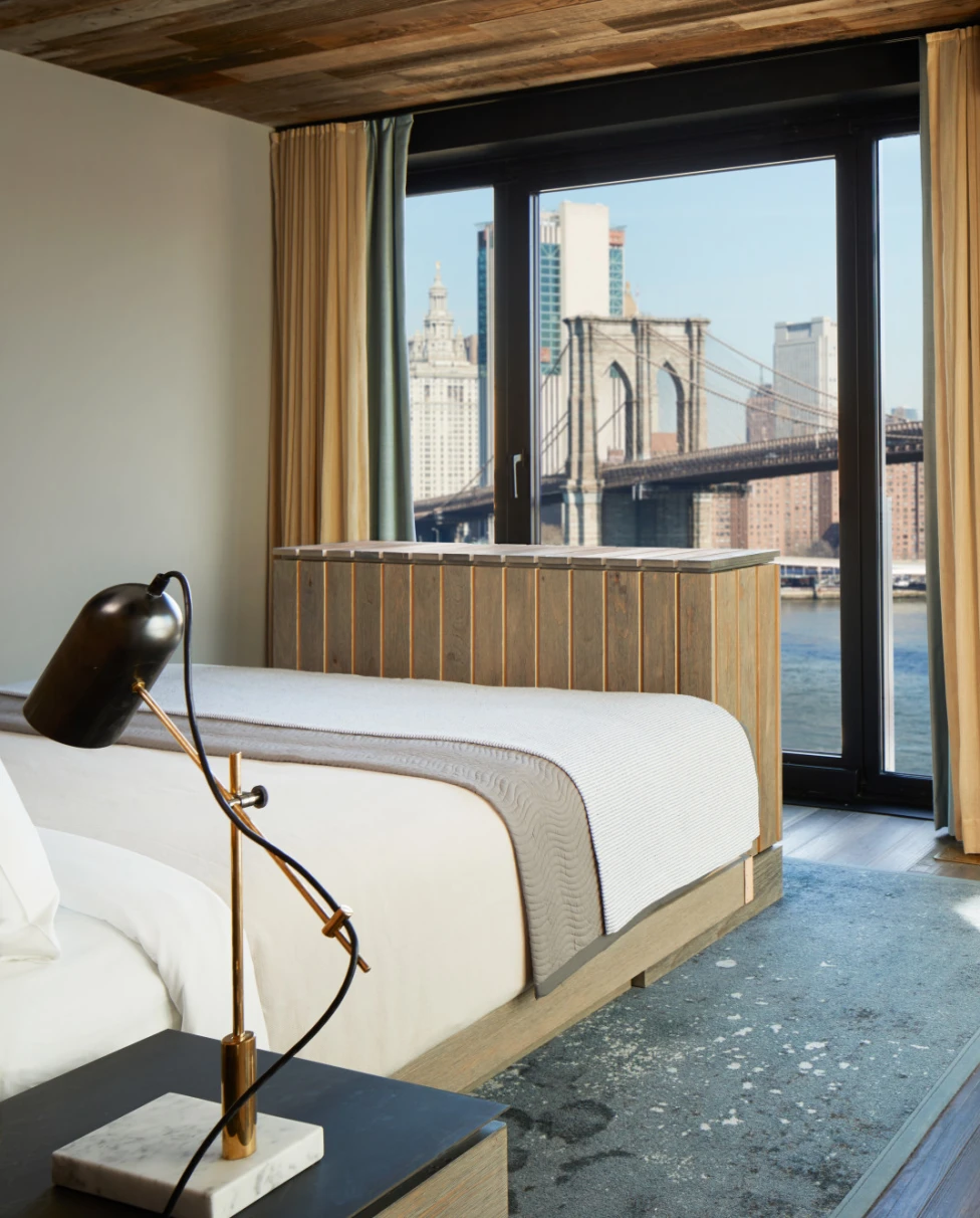1 Hotel Brooklyn Hotel suite with hammock and a view of BK Bridge