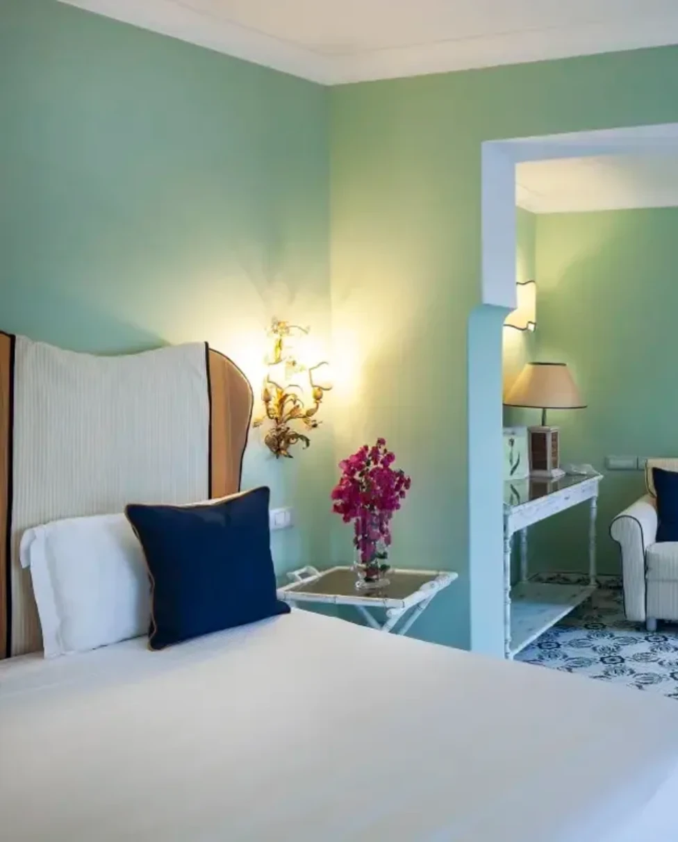 blue-walled hotel room