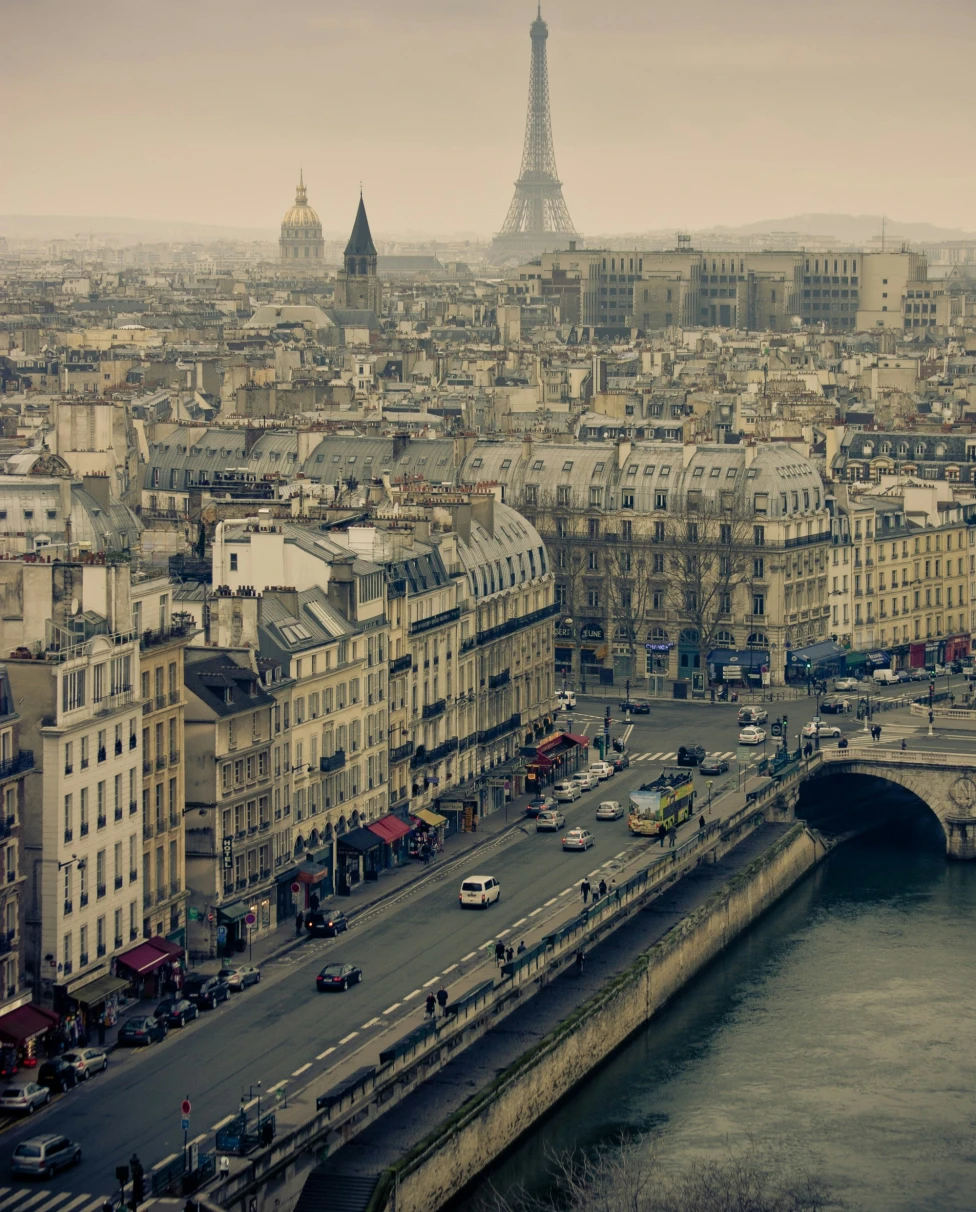 The city skyline from one of Paris' 5th arrondissement hotels with the Eiffel Tower towering over in the distance.