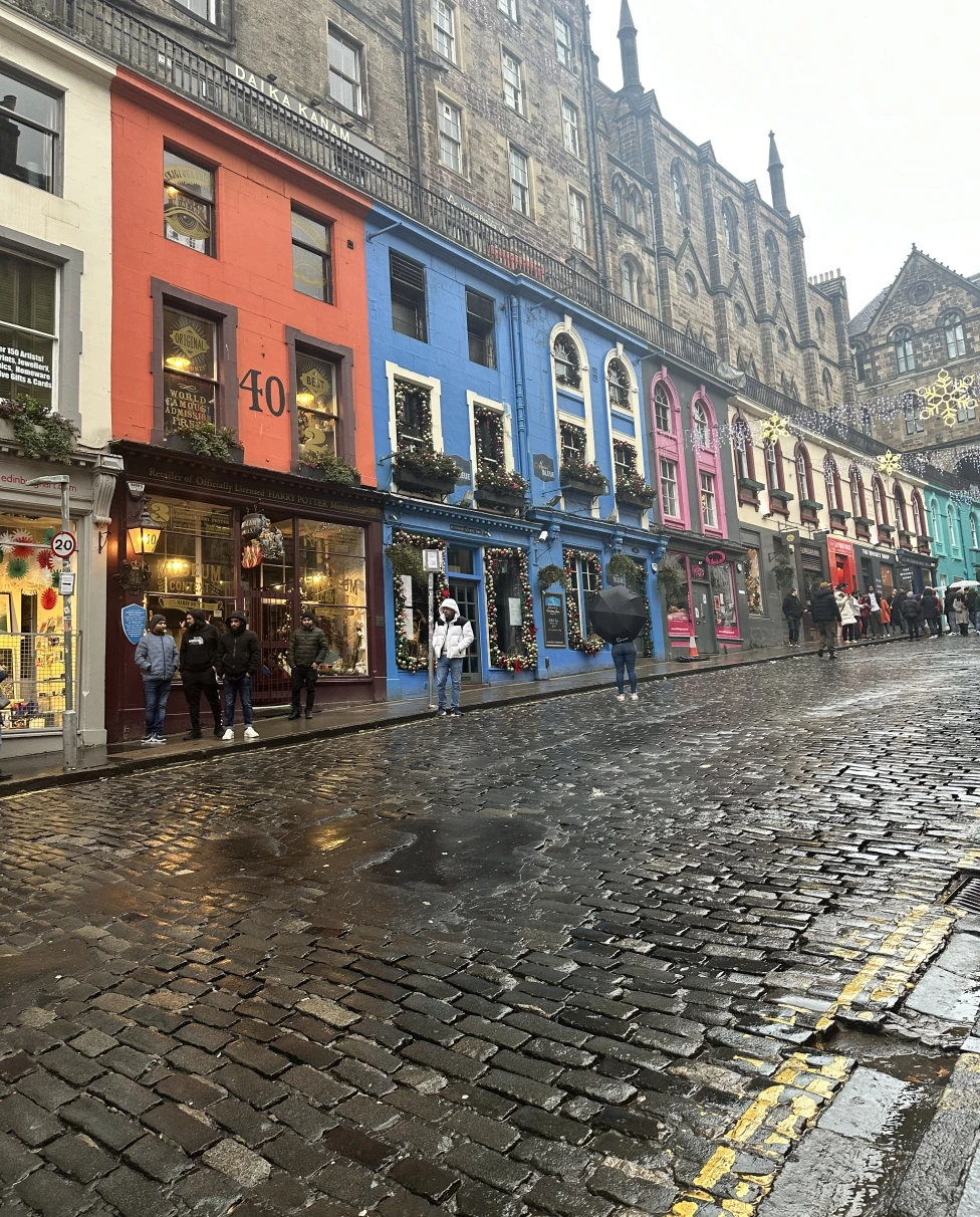 Victoria Street's colorful buildings, eclectic shops, and historic charm, near the best area to stay in Edinburgh.