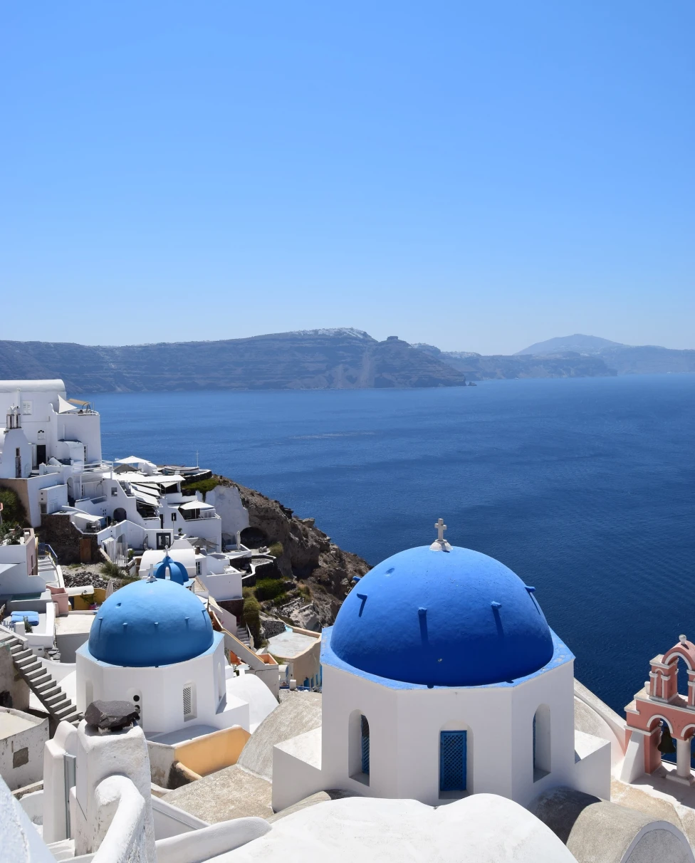 white buildings near the ocean during daytime