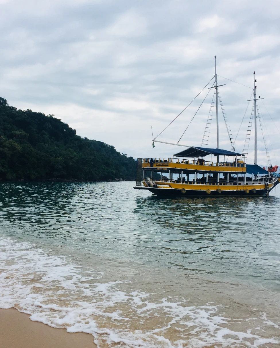 A boat in the middle of sea.