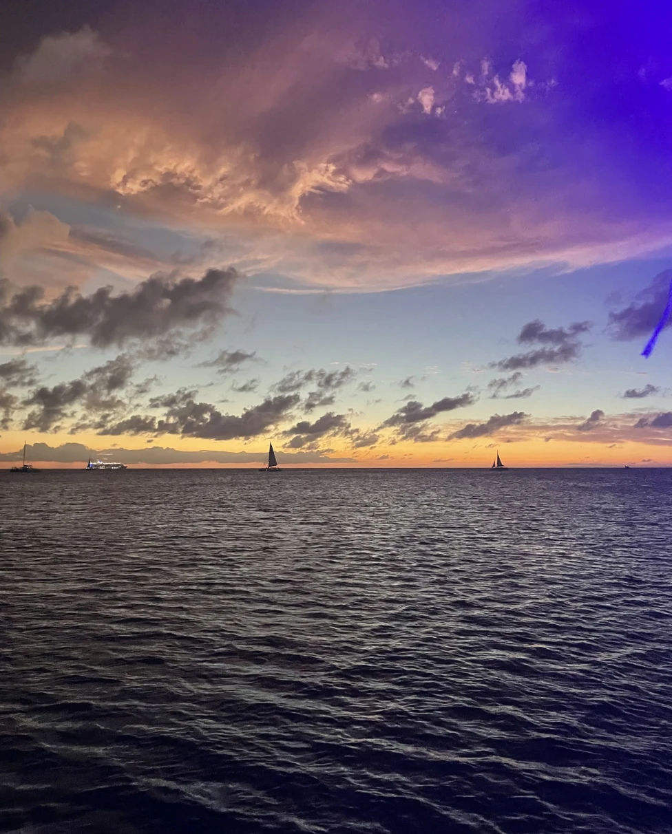 An aerial view of the sea during sunset.