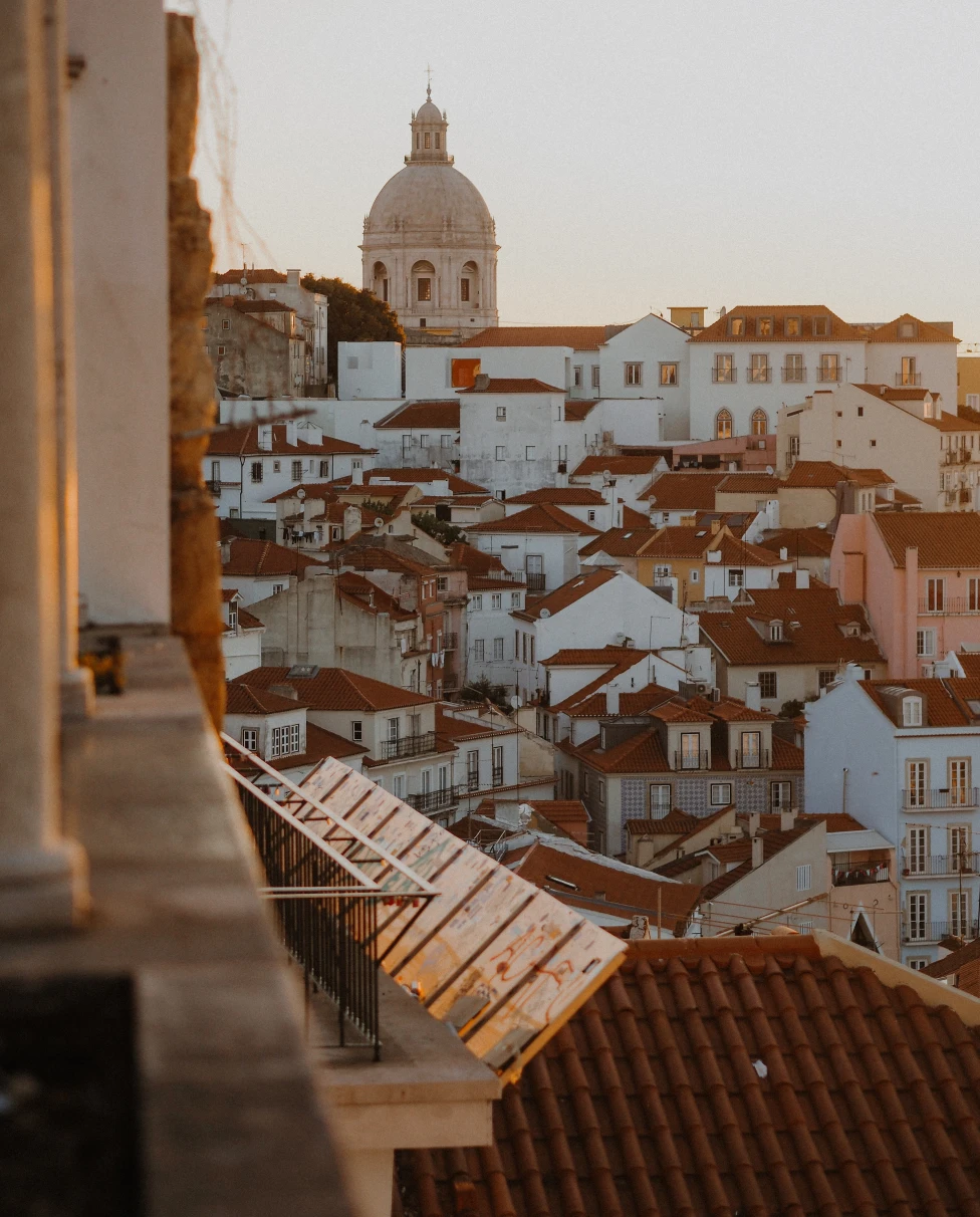 White and red houses during sunset