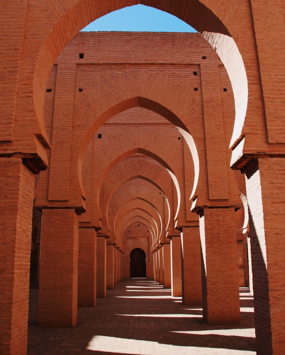 A series of brown concrete corridors outdoor during daytime